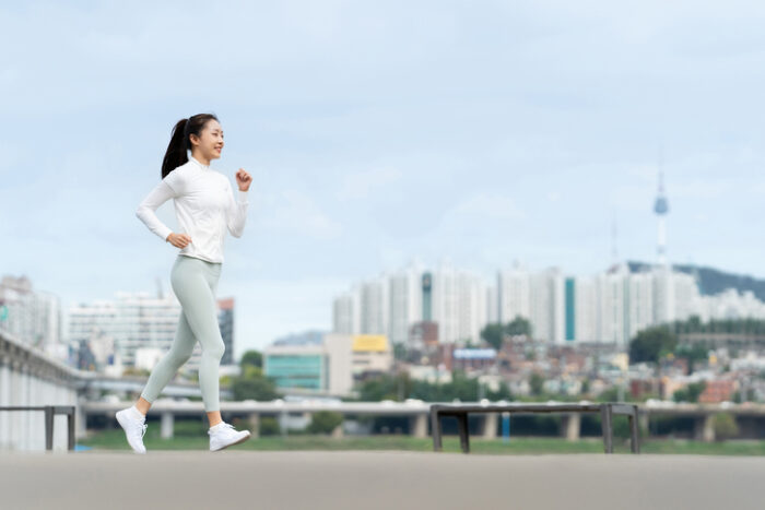 In addition to improving heart and lung function, what part of the body becomes stronger when you exercise by walking?